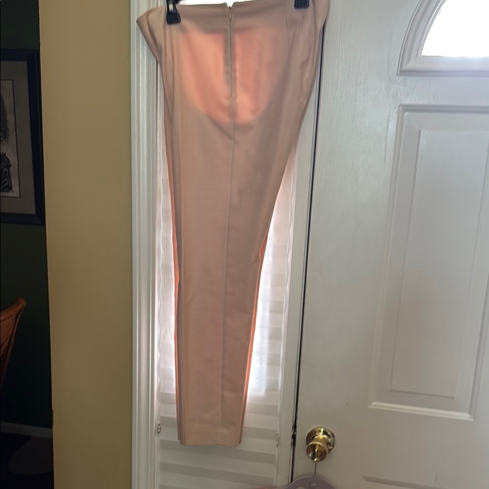Women’s pale pink pants in a size 8